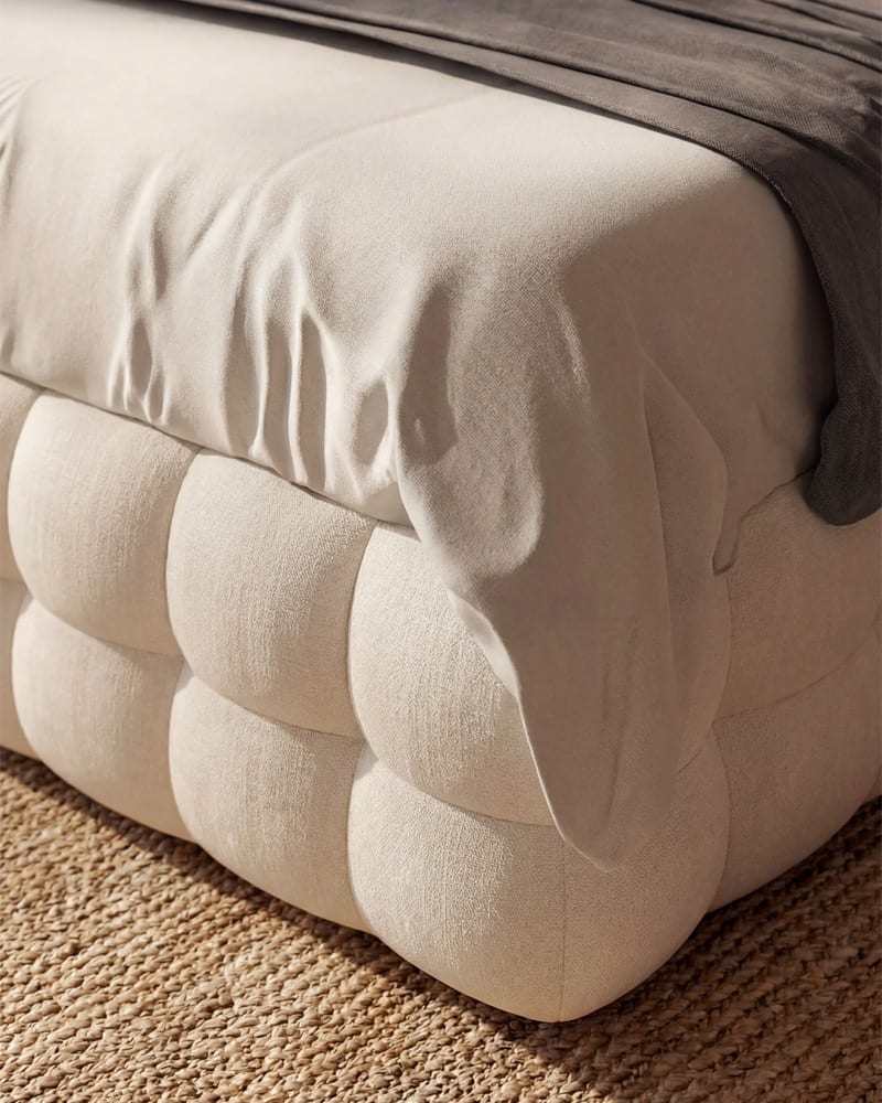 Deep boucle tufting on the Klara Platform Bed base, the mattress resting on top